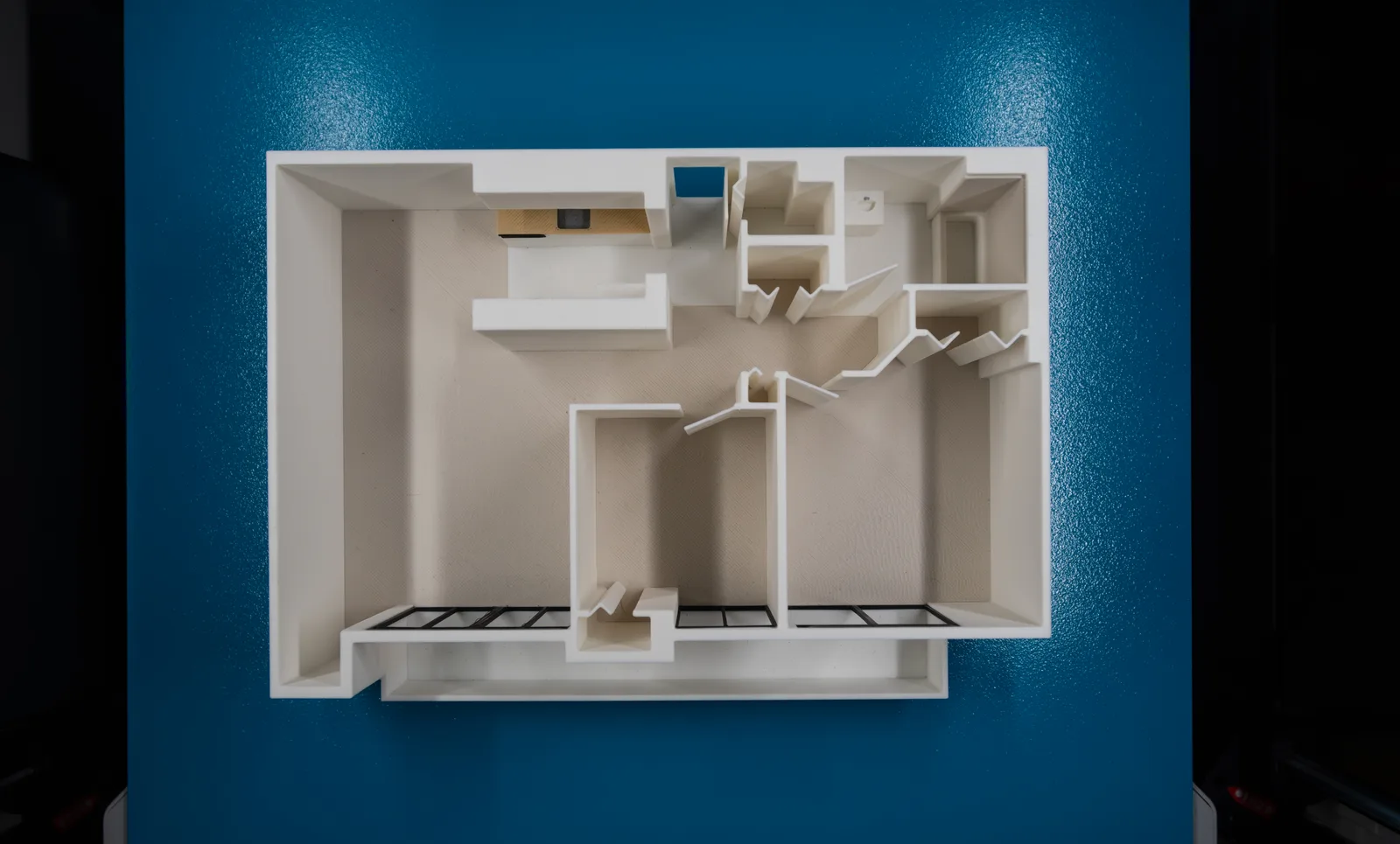 Top-down view of a 3D printed two-bedroom floor plan model