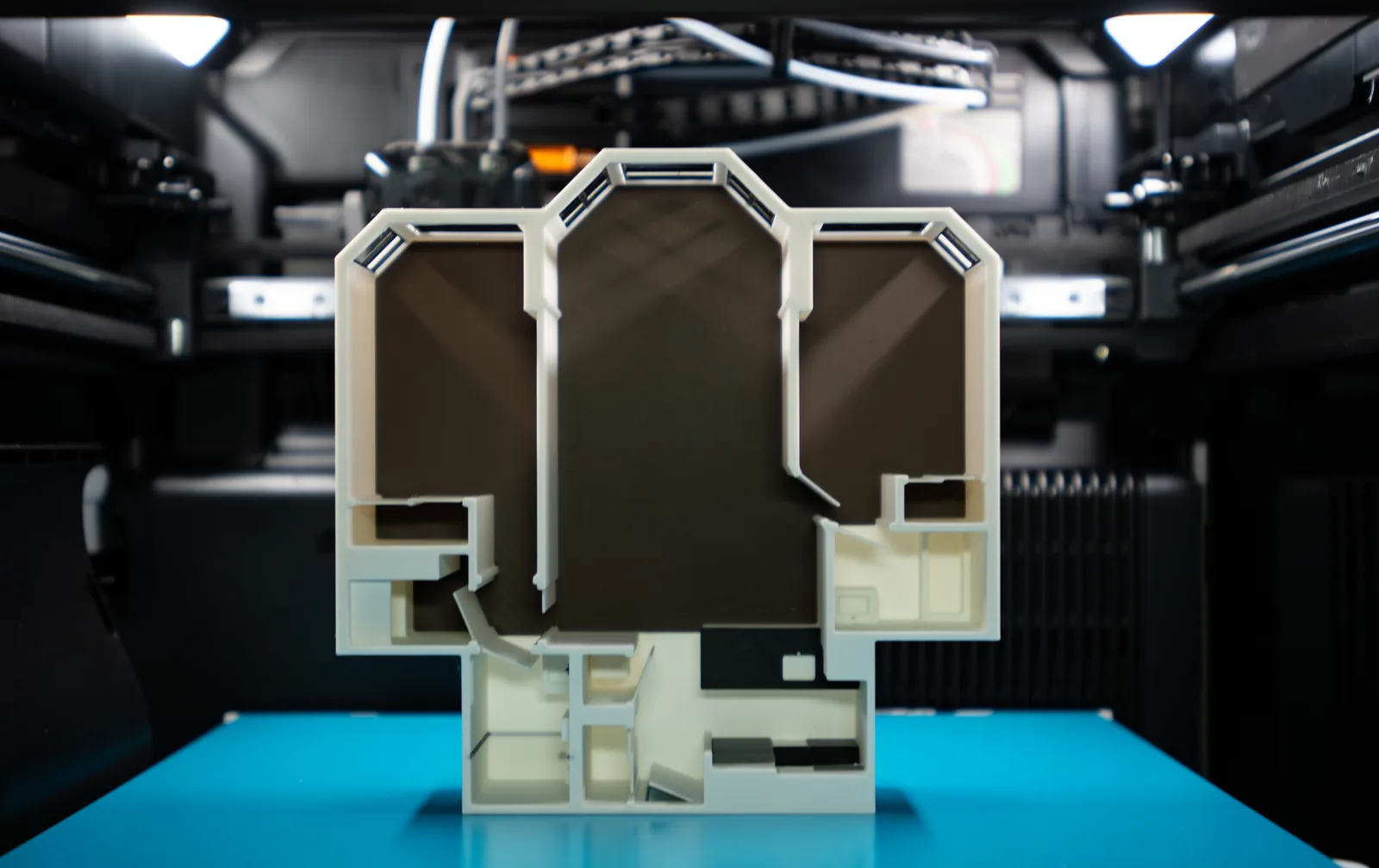 3D printed floor plan model standing on the print bed, front view